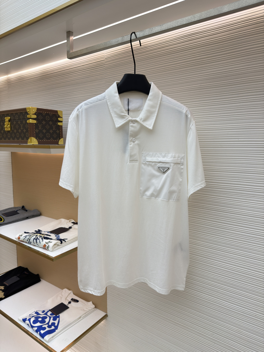 프라다(PRADA) 포켓 폴로 셔츠 의류