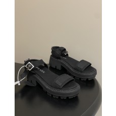 프라다(PRADA) 로마 원스트랩 캔버스 플랫폼 샌들 신발