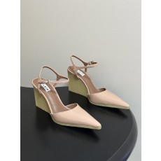 알라이아(ALAIA) 페이턴트 큐브 힐 슬링백 신발