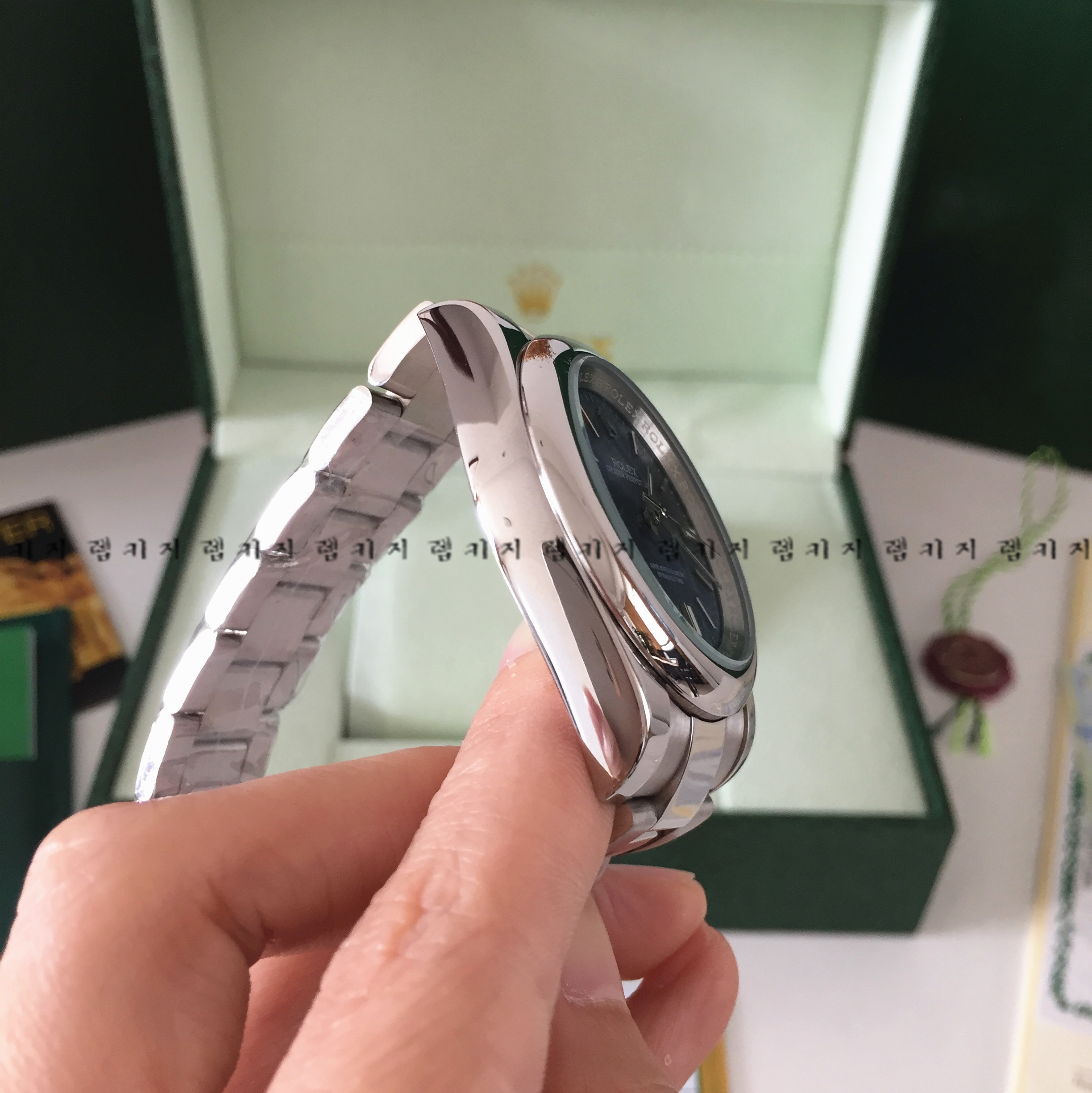 로렉스 오이스터 퍼페츄얼 블루다이얼 은장 메탈시계