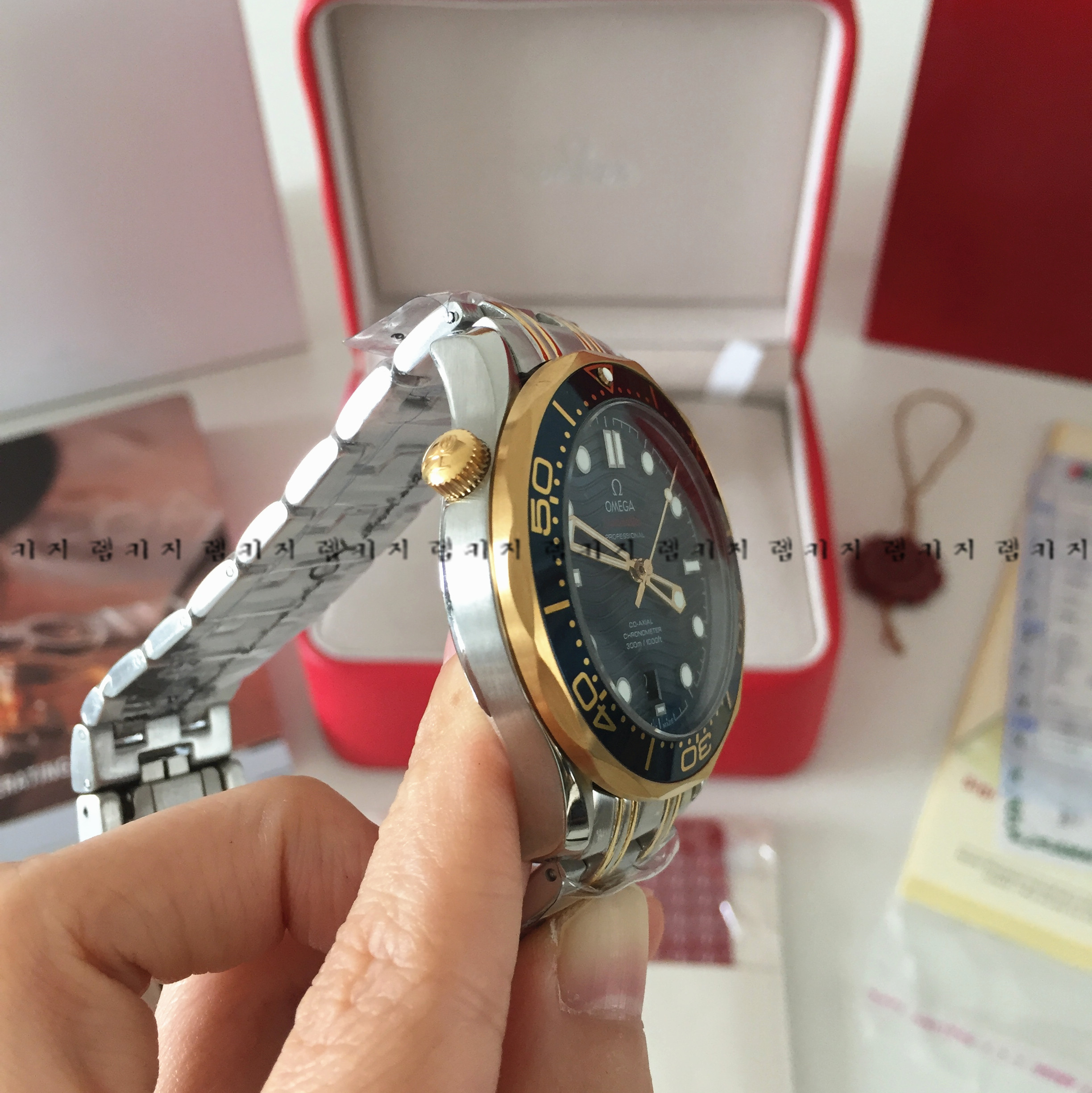 오메가 씨마스터 다이버 300 금장 콤비 메탈시계